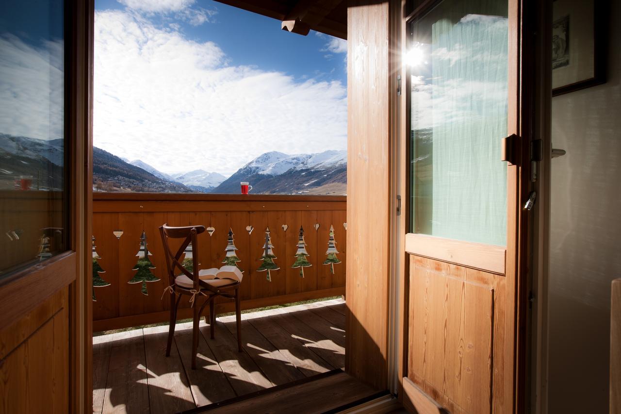 Les Fleurs Bleues Aparthotel Livigno Buitenkant foto